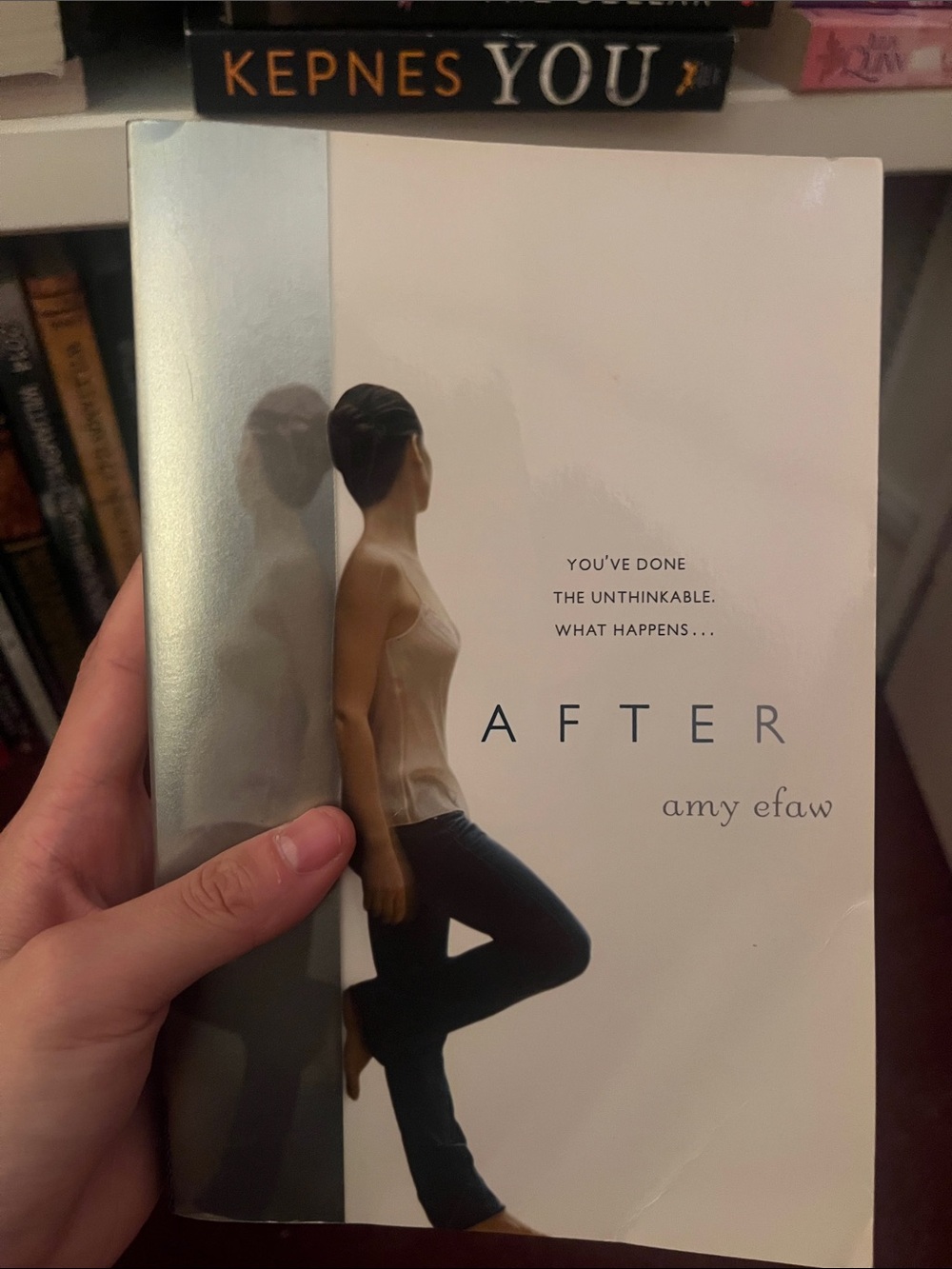 After by Amy Efaw — White & Navy Paperback Novel